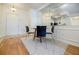Small dining area with glass table and modern chairs at 955 Juniper Ne St # 4027, Atlanta, GA 30309
