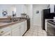 Kitchen features stainless steel appliances and tile flooring at 955 Juniper Ne St # 4027, Atlanta, GA 30309