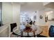 Open concept dining area with glass table and hardwood floors at 955 Juniper Ne St # 4027, Atlanta, GA 30309