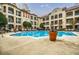 Inviting community pool with surrounding lounge chairs at 955 Juniper Ne St # 4027, Atlanta, GA 30309