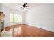 Bright living room with hardwood floors, fireplace, and large windows at 3635 E Paces Ne Cir # 1214, Atlanta, GA 30326