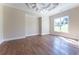 Spacious dining room featuring hardwood floors and a tray ceiling at 971 Heathchase Dr, Suwanee, GA 30024