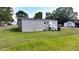 Gray mobile home with large grassy yard at 3525 Hamilton Mill Rd, Buford, GA 30519