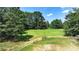 Aerial view of property showing a large yard and outbuildings at 3525 Hamilton Mill Rd, Buford, GA 30519