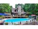 Inviting in-ground pool with large deck at 3525 Hamilton Mill Rd, Buford, GA 30519