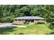 Brick ranch home with a covered porch at 3525 Hamilton Mill Rd, Buford, GA 30519