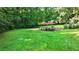 Landscaped yard with patio furniture at 3525 Hamilton Mill Rd, Buford, GA 30519
