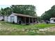 Old workshop with covered area at 3525 Hamilton Mill Rd, Buford, GA 30519