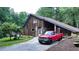 Rustic home with a red truck parked in the driveway at 3525 Hamilton Mill Rd, Buford, GA 30519