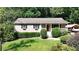 House exterior showcasing landscaping and a porch at 3525 Hamilton Mill Rd, Buford, GA 30519