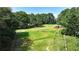 Aerial view of property showing a large yard and outbuildings at 3525 Hamilton Mill Rd, Buford, GA 30519