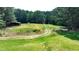 Aerial view of property showing a large yard and outbuildings at 3525 Hamilton Mill Rd, Buford, GA 30519