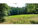 Aerial view of property showing a large yard and outbuildings at 3525 Hamilton Mill Rd, Buford, GA 30519