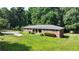Brick ranch home with a large yard at 3525 Hamilton Mill Rd, Buford, GA 30519