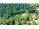 Aerial view of a cleared lot surrounded by trees at 3525 Hamilton Mill Rd, Buford, GA 30519