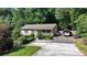 Charming ranch home with front porch and driveway at 3525 Hamilton Mill Rd, Buford, GA 30519