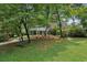 Brick house with carport and landscaped yard at 5622 Williamsburg Dr, Norcross, GA 30093