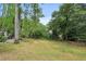 Wooded backyard providing a serene and private setting at 5622 Williamsburg Dr, Norcross, GA 30093