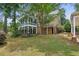 House exterior showcasing a side view and landscaping at 5622 Williamsburg Dr, Norcross, GA 30093