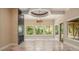 Bright Gathering room with fireplace and wall of windows at 1608 Golden Creek Sw Ct, Conyers, GA 30094