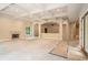Open great room with fireplace and high ceilings at 1608 Golden Creek Sw Ct, Conyers, GA 30094