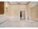 Spacious living area with decorative molding and tile floors at 1608 Golden Creek Sw Ct, Conyers, GA 30094