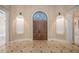 Spacious entryway with tiled floors and double wood doors at 1608 Golden Creek Sw Ct, Conyers, GA 30094