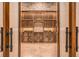 Impressive wine cellar with custom wooden racks and ample storage at 1608 Golden Creek Sw Ct, Conyers, GA 30094