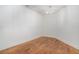 Spacious bonus room featuring hardwood floors and a modern chandelier at 1608 Golden Creek Sw Ct, Conyers, GA 30094
