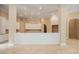 Large kitchen with white cabinets and island at 1608 Golden Creek Sw Ct, Conyers, GA 30094