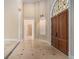 Bright and airy entryway with high ceilings and tiled floors at 1608 Golden Creek Sw Ct, Conyers, GA 30094