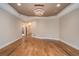 Main bedroom with hardwood floors and access to bathroom at 1608 Golden Creek Sw Ct, Conyers, GA 30094