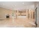 Open concept great room with kitchen and fireplace at 1608 Golden Creek Sw Ct, Conyers, GA 30094