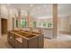 Unfinished kitchen island with gray cabinets at 1608 Golden Creek Sw Ct, Conyers, GA 30094