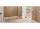 Bright hallway with tile flooring and neutral walls at 1608 Golden Creek Sw Ct, Conyers, GA 30094