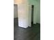 Bedroom with a bi-fold closet door and gray flooring at 1146 Old Covington Se Hwy, Conyers, GA 30012