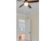 Bright bedroom with hardwood floors and access to another room at 929 Hilltop Park Ct, Dacula, GA 30019