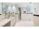 Large bathroom with marble vanity, shower, and black and white tile floor at 4660 Jett Rd, Atlanta, GA 30327