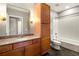 Bathroom with granite vanity and a large bathtub at 620 Glen Iris Ne Dr # 205, Atlanta, GA 30308