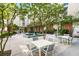 Relaxing courtyard with fountain, tables, and chairs, offering a pleasant outdoor space at 620 Glen Iris Ne Dr # 205, Atlanta, GA 30308