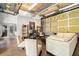 Spacious common area with comfortable seating, creating a welcoming community atmosphere at 620 Glen Iris Ne Dr # 205, Atlanta, GA 30308
