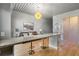 Open kitchen with granite counter and breakfast bar seating at 620 Glen Iris Ne Dr # 205, Atlanta, GA 30308