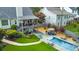 Aerial view of a house with a large backyard, pool, and patio at 808 Sylvan Dr, Marietta, GA 30066