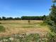Picturesque view of a vast, open field ideal for recreation at 410 Kilcrease Rd, Auburn, GA 30011