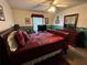 Bedroom with a sleigh bed, dresser, and ceiling fan at 410 Kilcrease Rd, Auburn, GA 30011