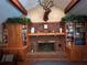 Brick fireplace as a focal point in the living room with built-in shelving at 410 Kilcrease Rd, Auburn, GA 30011