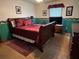 Bedroom with a sleigh bed, dresser, and window coverings at 410 Kilcrease Rd, Auburn, GA 30011