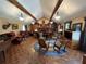 Large living room with hardwood floors, vaulted ceiling, fireplace, and ample seating at 410 Kilcrease Rd, Auburn, GA 30011