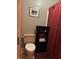 Clean bathroom featuring a shower, toilet and linen cabinet at 410 Kilcrease Rd, Auburn, GA 30011