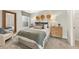 Bedroom with a queen bed and a wood dresser at 1206 Brooks Ryan Run(Lot 102), Lawrenceville, GA 30043